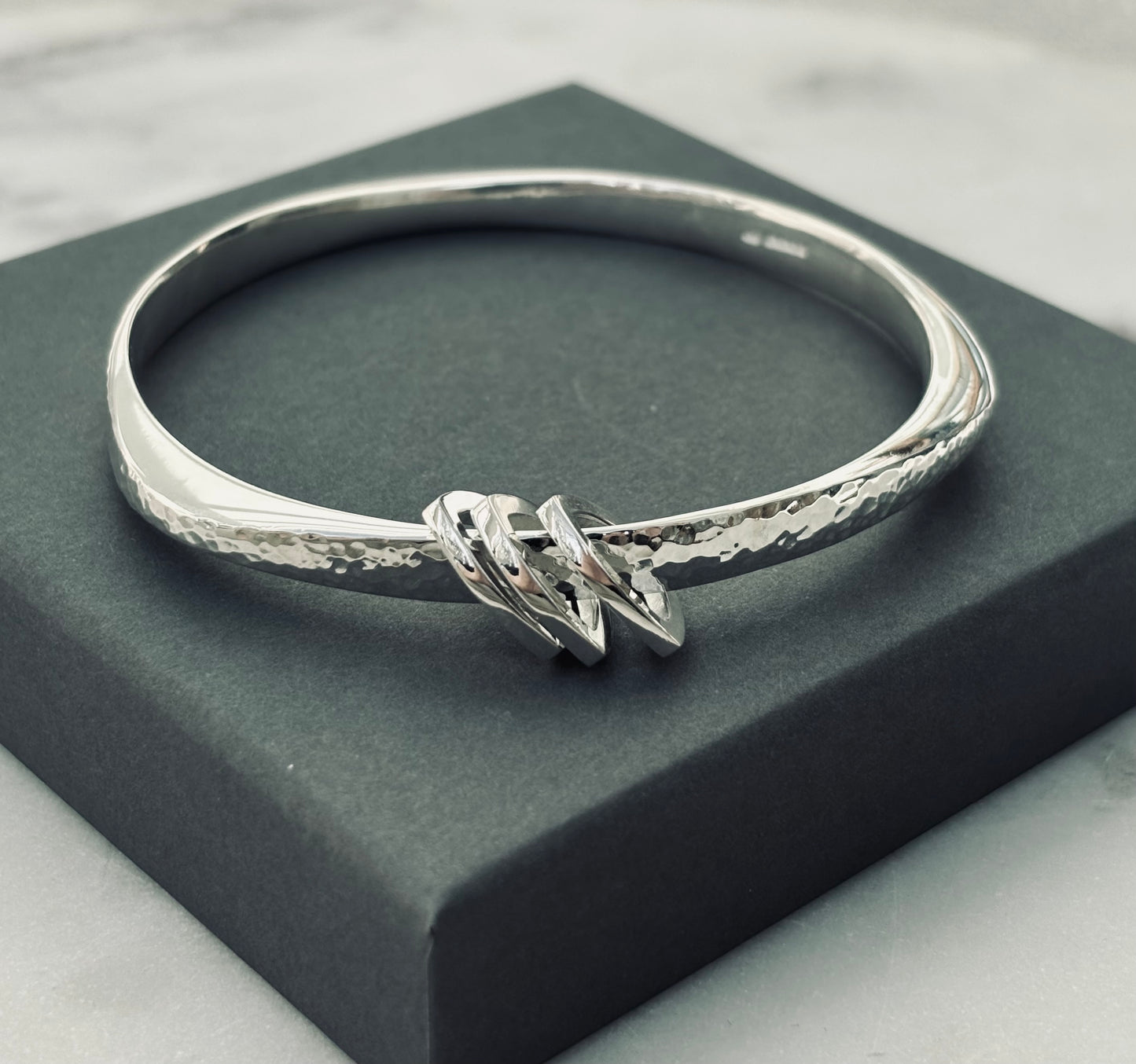 Wide Flow bangle with triangle charms