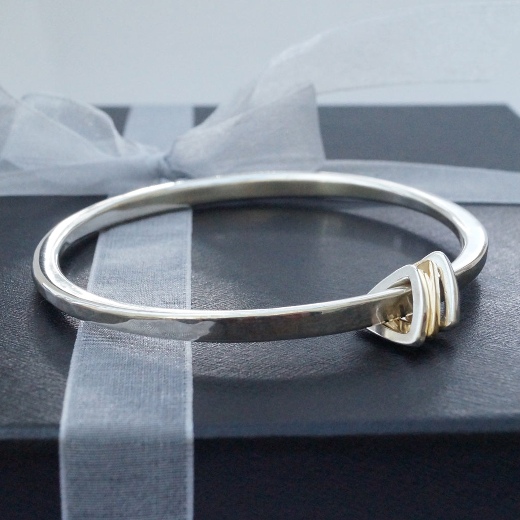Oval Bangle with Triangle Charms