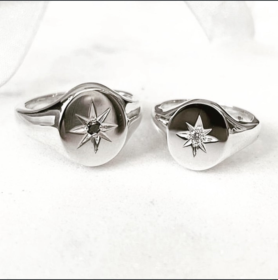 Oval star set diamond signet ring