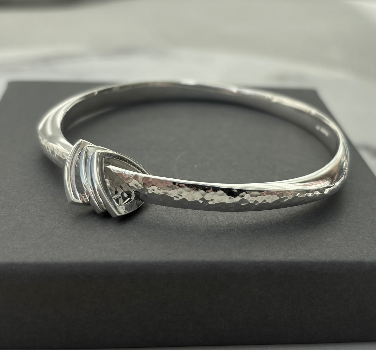 Wide Flow bangle with triangle charms