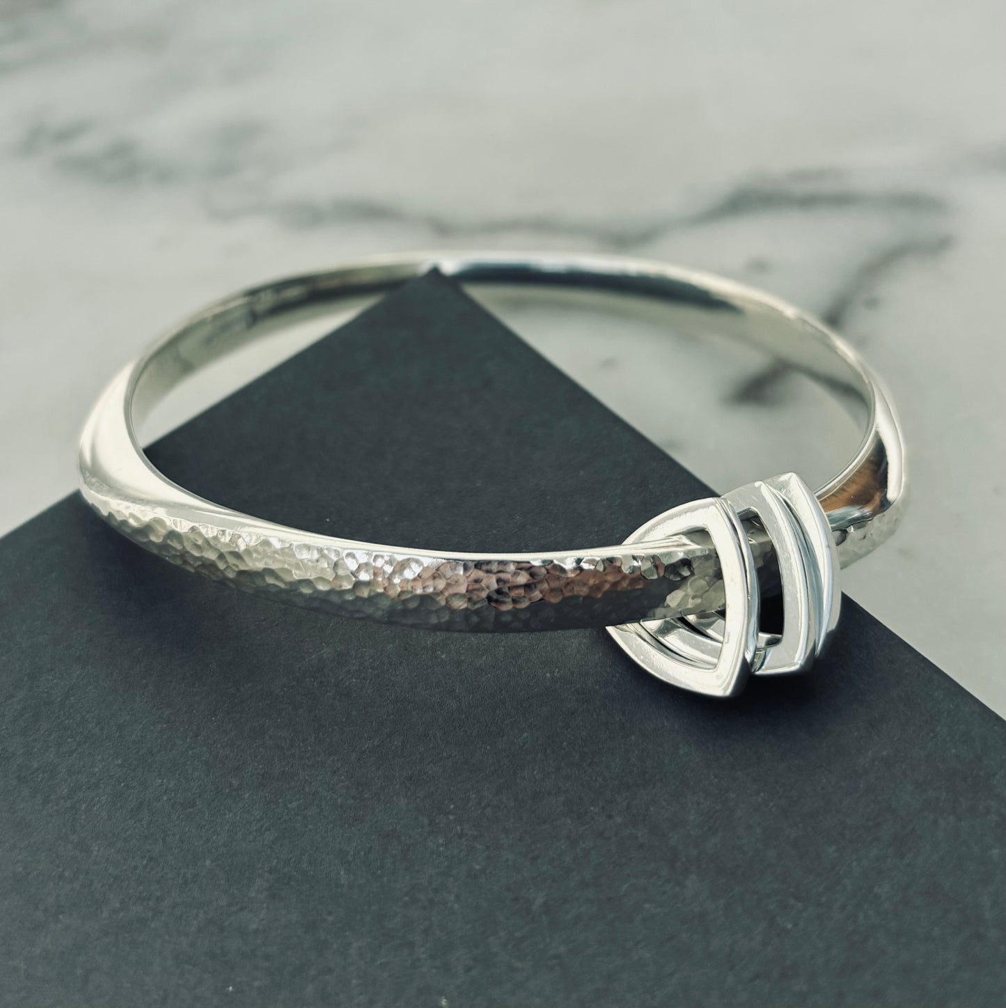 Wide Flow bangle with triangle charms